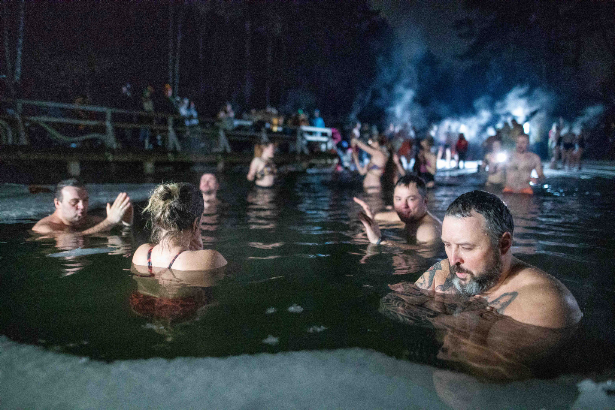 Ночное купание в Зеленых озерах. Вильнюс, 2022. (Ирмантас Гелунас/BNS).